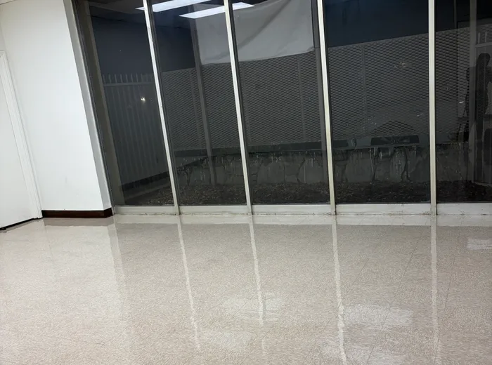 Restored high-gloss floor finish by EVM Clean and Finish